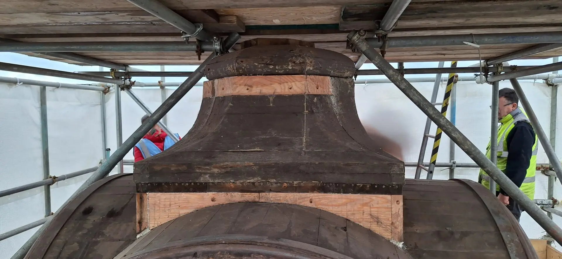 Starting to replace the rotten wood on the clock tower of the Town Hall
